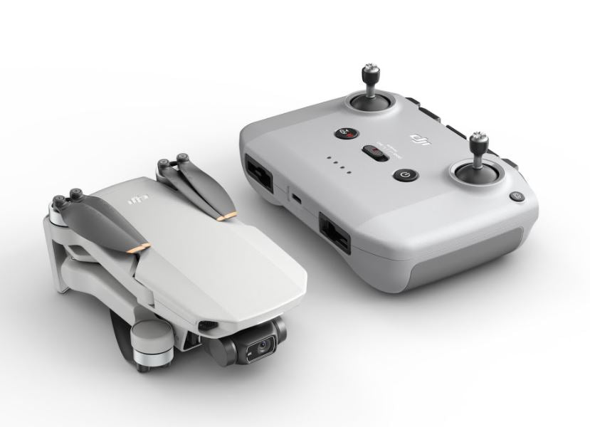 DJI Mini 2 – Ultralight and Foldable Drone Quadcopter, 3-Axis Gimbal with  4K Camera, 12MP Photo, 31 Mins Flight Time, OcuSync 2.0 10km HD Video